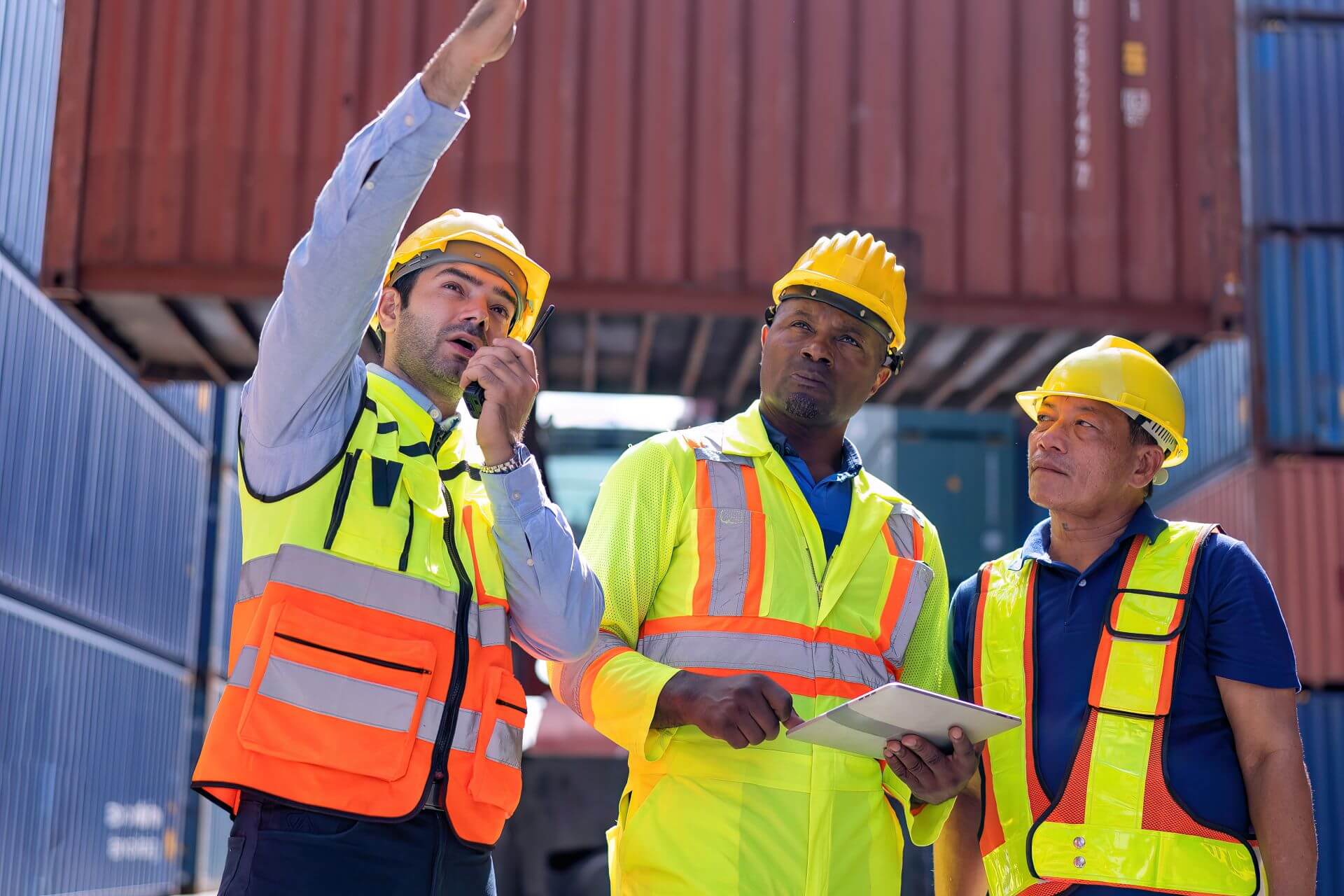 engineer-working-in-container-storage-yard-stand-f-2024-10-13-07-40-04-utc.jpg