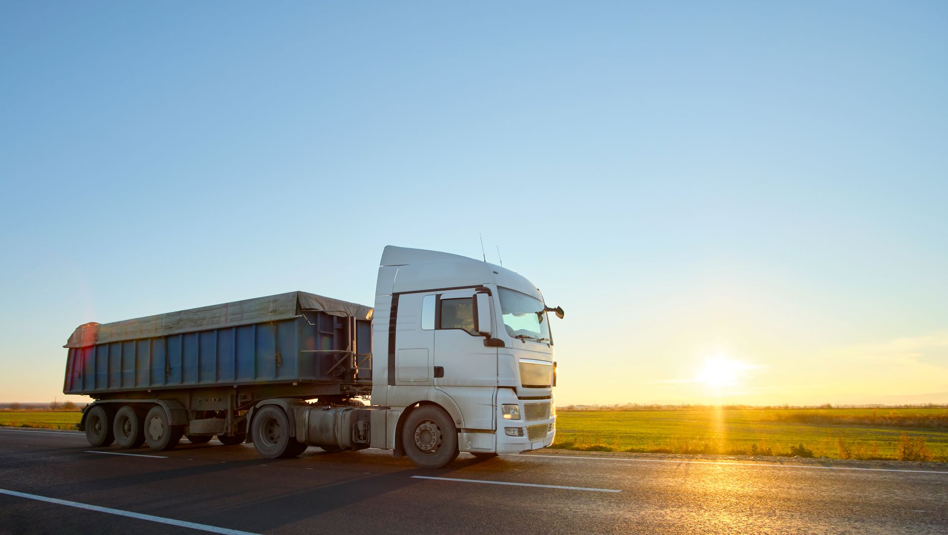 semi-truck-with-tipping-cargo-trailer-transporting-2024-12-06-23-10-59-utc.jpg